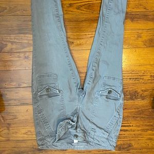 grey skinny jeans with several pockets